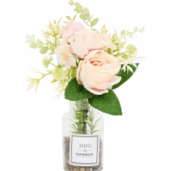 Kunstbloemen in glazen fles