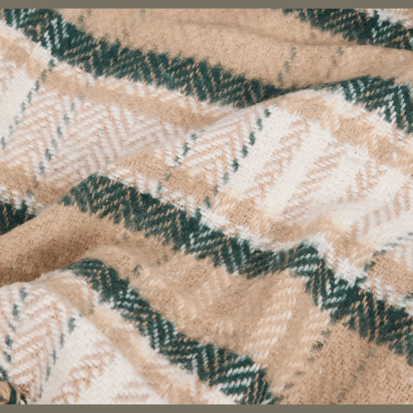Plaid met franjes